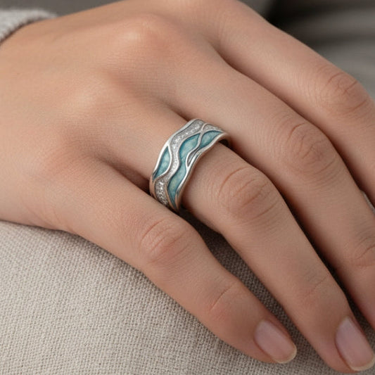 Anillo plateado con ondas turquesa, vista 2
