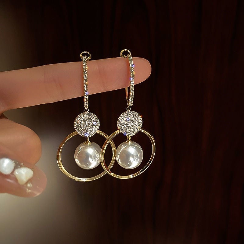 Pendientes con perla y aro dorado
