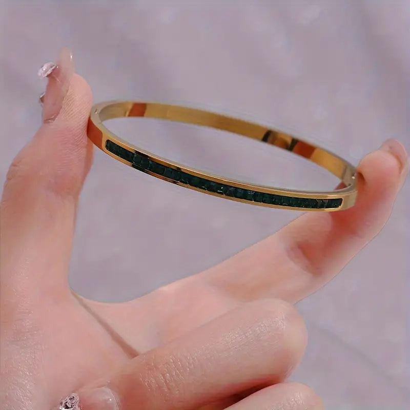 Brazalete dorado con piedras verdes, vista 3