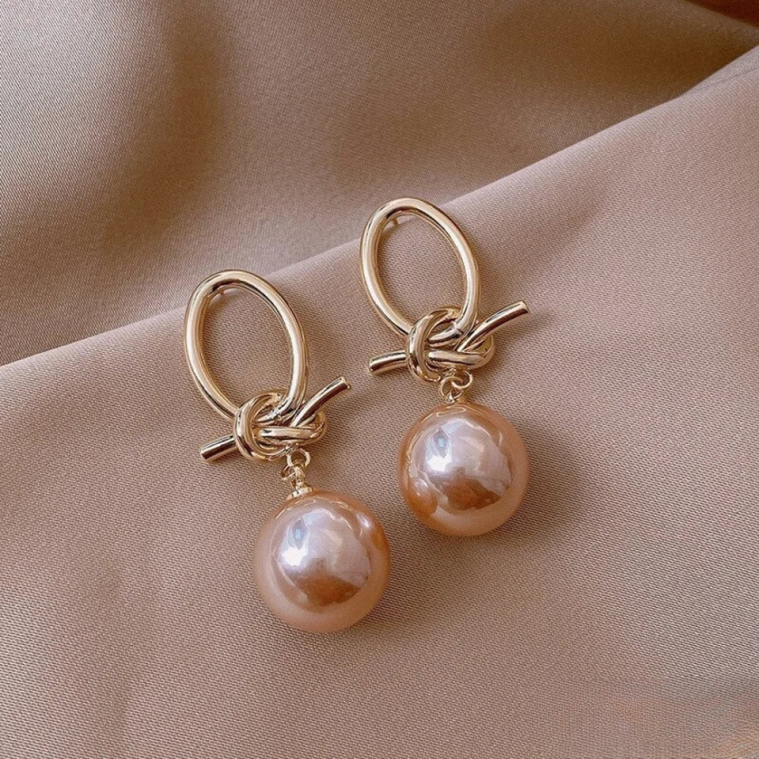 Pendientes largos con perla y nudo