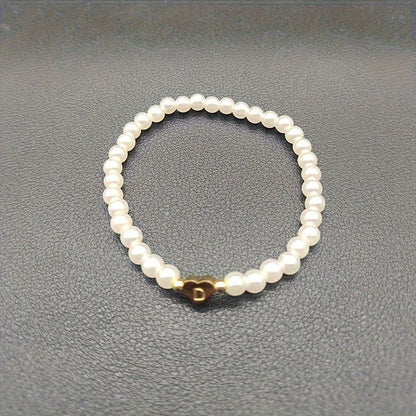 Pulsera de perlas con inicial en corazón, vista 8