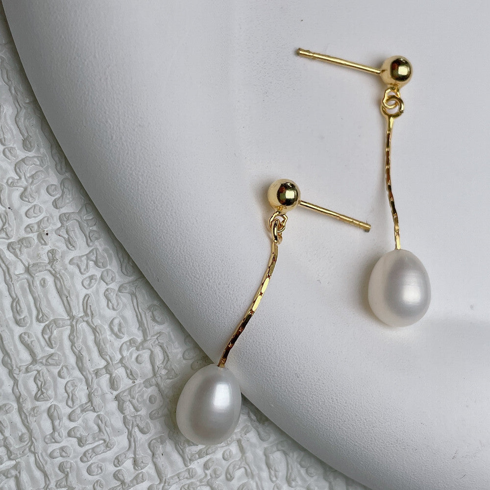Pendientes largos con perla
