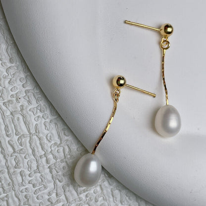 Pendientes largos con perla