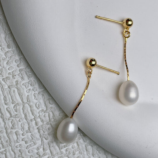 Pendientes largos con perla