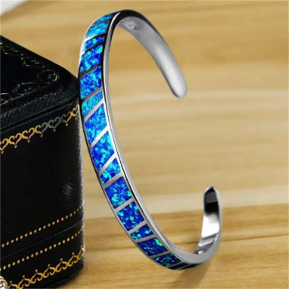 Pulsera ajustable plateada con piedra opalina azul, vista 3