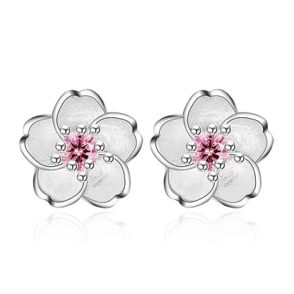 Pendientes de botón de flor con circonitas