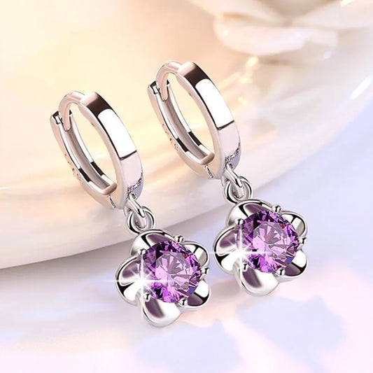 Pendientes plateados con circonitas moradas y blancas