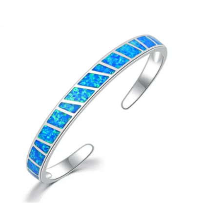 Pulsera ajustable plateada con piedra opalina azul