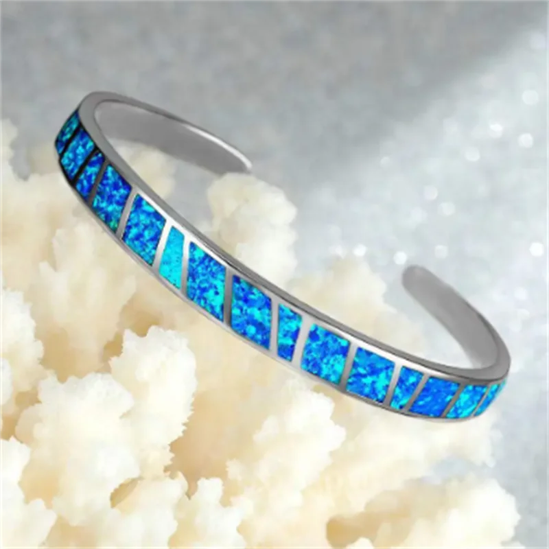 Pulsera ajustable plateada con piedra opalina azul, vista 4
