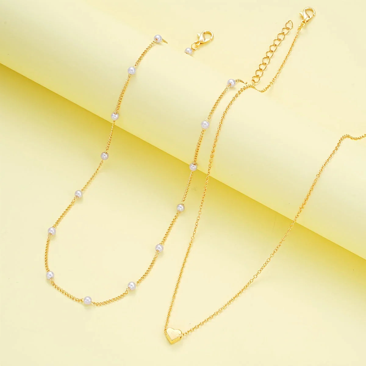 Conjunto de collar y pulsera con corazón, vista 3
