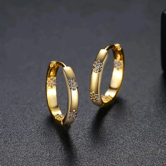 Aros vintage dorados con flores