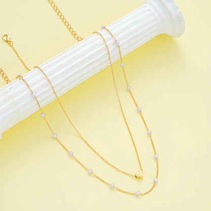 Conjunto de collar y pulsera con corazón, vista 2