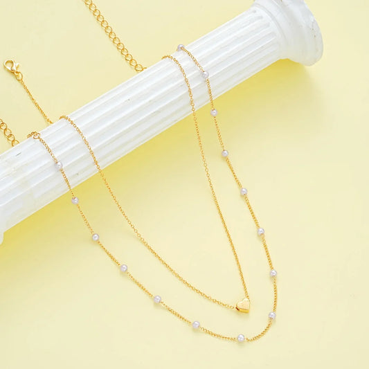 Conjunto de collar y pulsera con corazón, vista 2