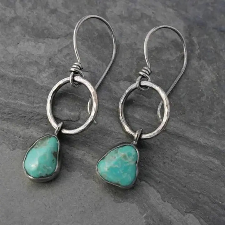 Pendientes vintage plateados con piedra turquesa