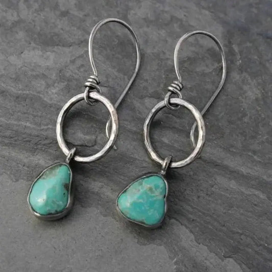 Pendientes vintage plateados con piedra turquesa