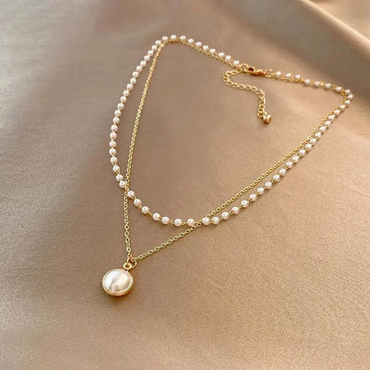 Collar de perlas con colgante