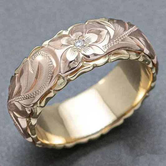 Anillo dorado con rosa