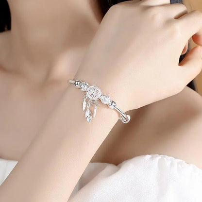 Pulsera plateada con atrapasueños