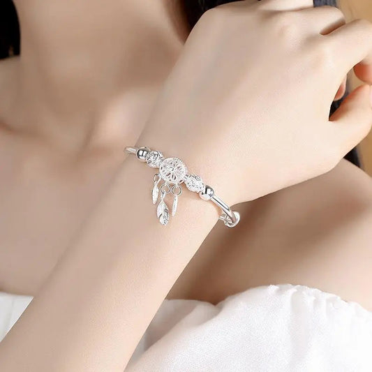 Pulsera plateada con atrapasueños