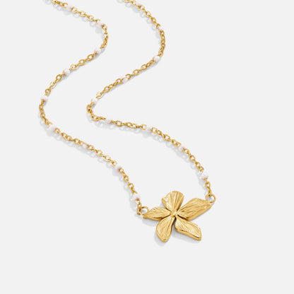 Collar dorado con flor, vista 3