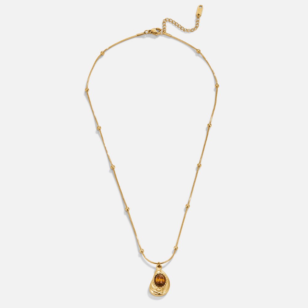 Collar dorado con piedra marrón, vista 5